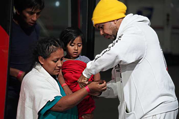 ‘It represents freedom’: Volunteers tear Texas tags off arriving migrants as tents rise in Randall’s Island 6