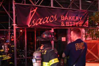 Firefighters take on blaze that broke out in Brooklyn bakery 18 The scene of the fire at Isaacs Bakery and Bites in Brooklyn