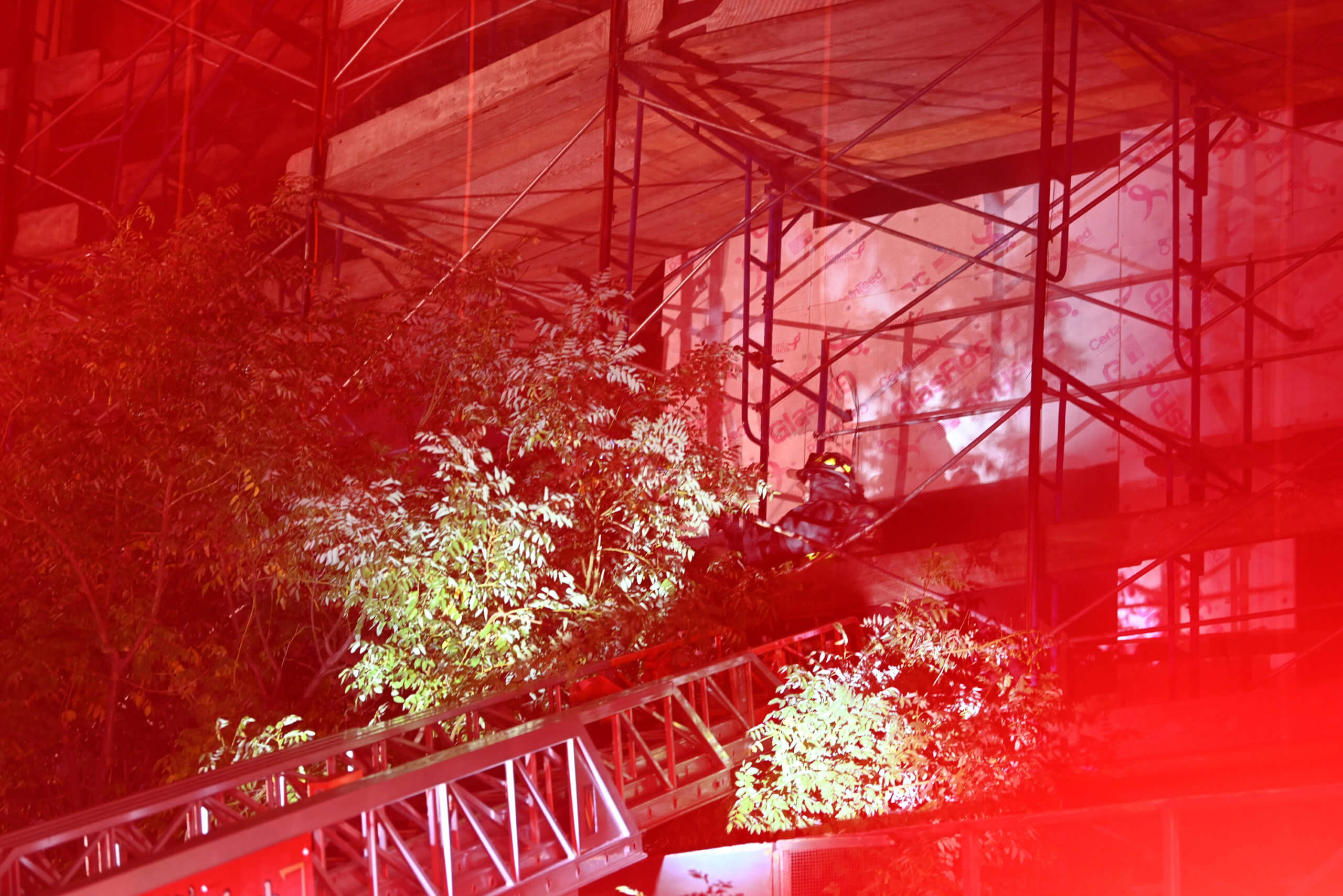 A firefighter operates at a two alarm fire at 1417 Avenue J in Midwood