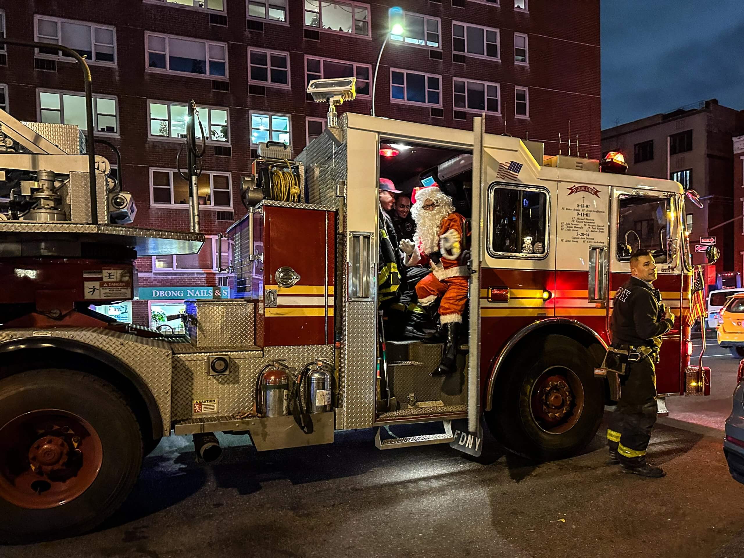 Santa lights the tree at Father Fagan Park in Soho 8