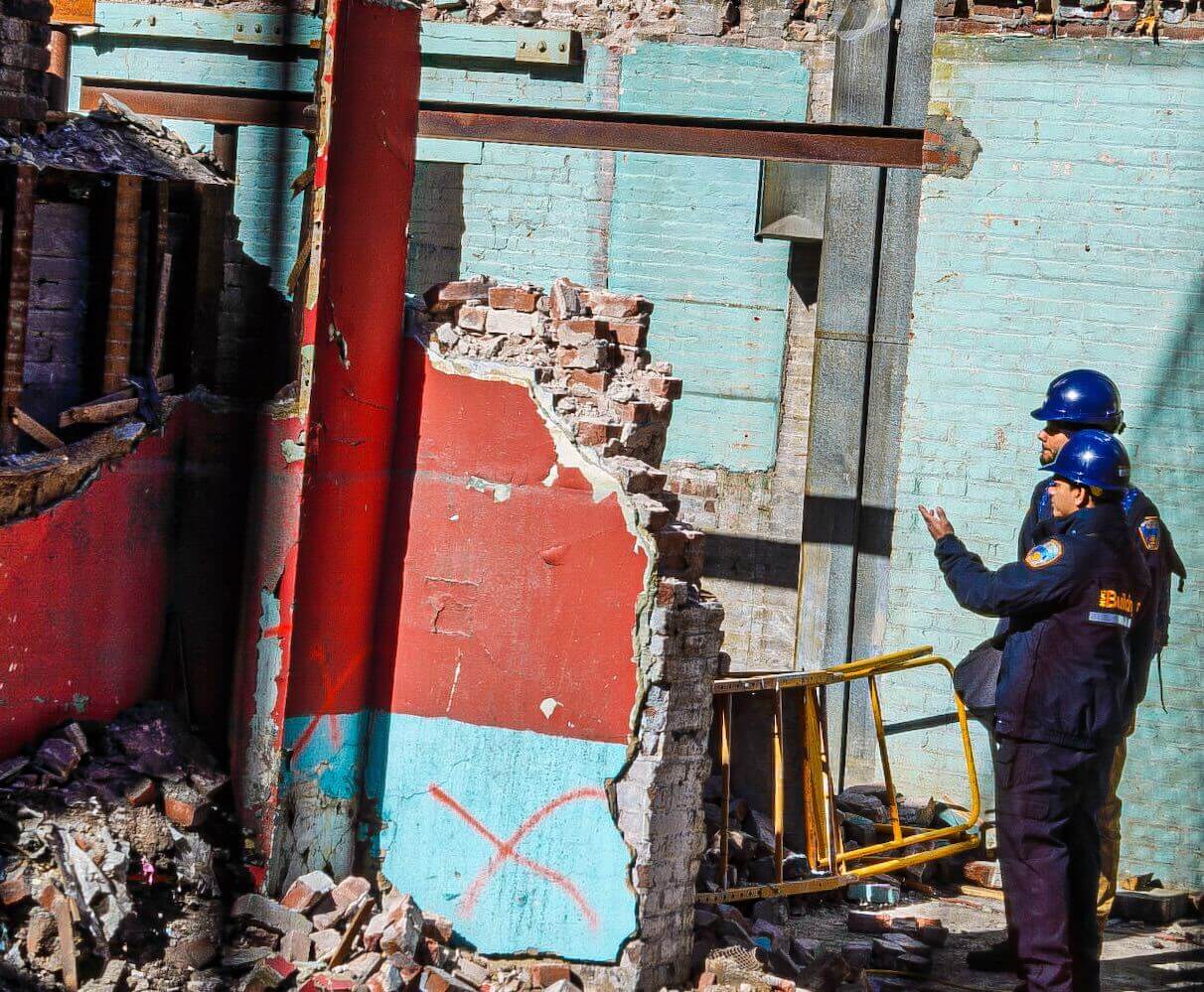 Chinatown building collapse injures three construction workers and kills one; numerous building violations found 5 Scene