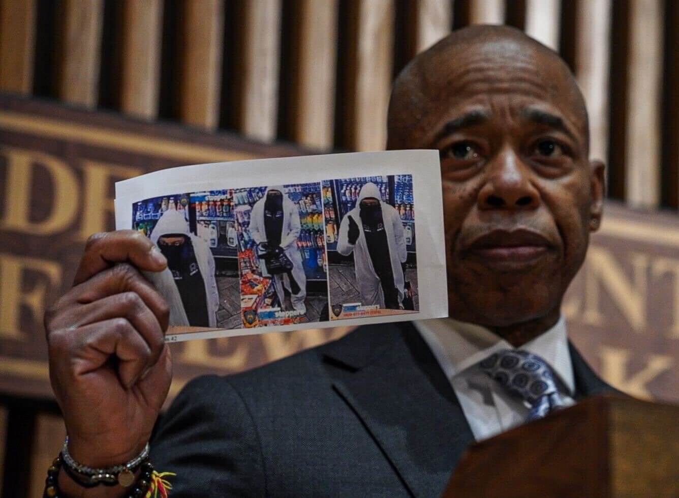 Alleged Upper East Side robber accused of shooting bodega worker dead gets cuffed 7 Mayor Eric Adams held a photo of a suspect