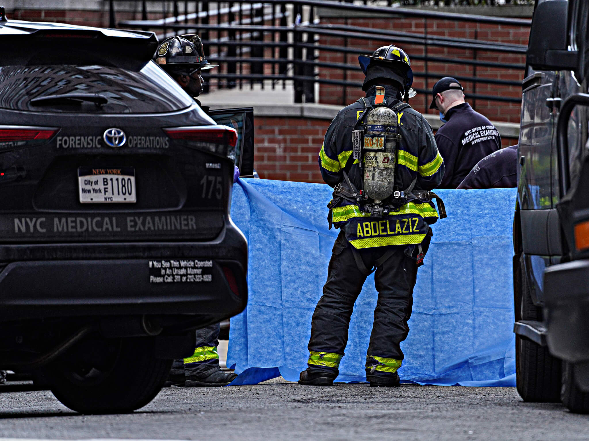 Massive emergency response in Midtown after woman found dead in car from exposure to 'hazardous materials' 8