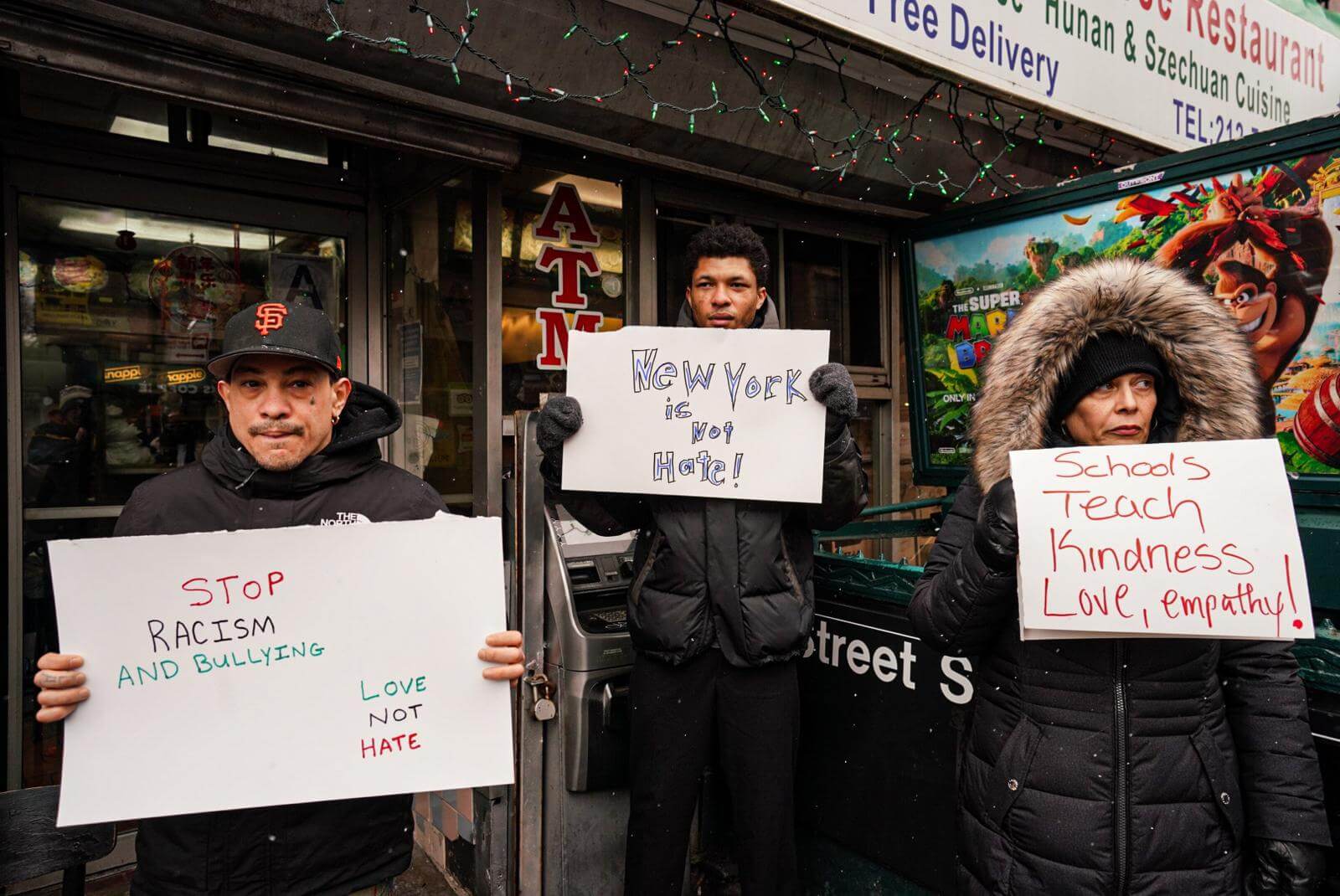 Upper Manhattan residents rally for justice after autistic 'transit kid' bullied and beaten by teenagers in subway 7 Different Slogans in Rally