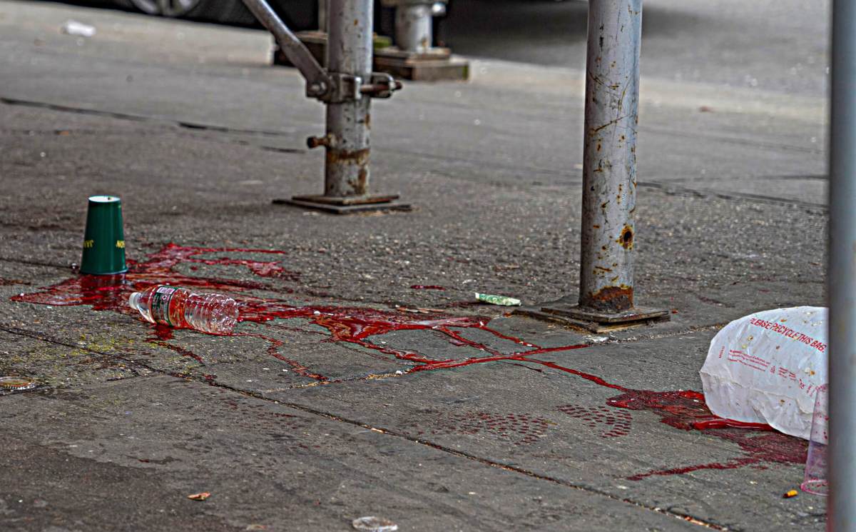 Pair arrested in connection to fatal shooting outside Harlem liquor store 3 Blood drips down the sidewalk