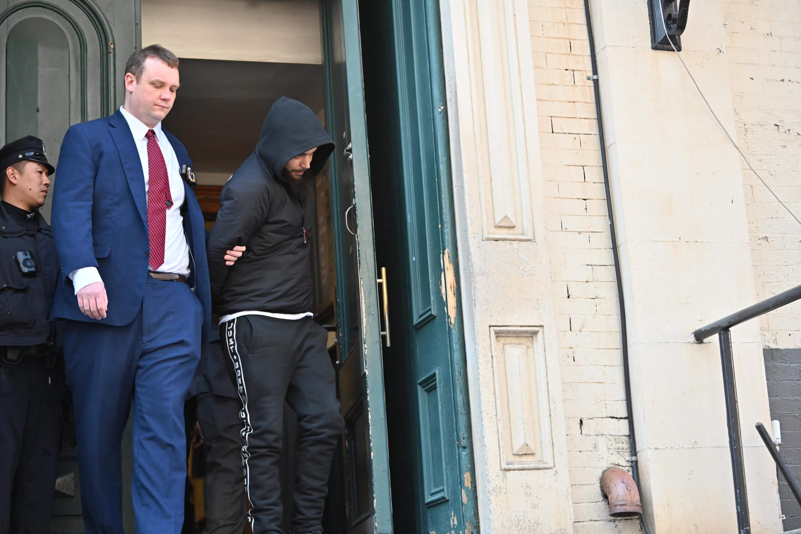 Jayqwan Hamilton being arrested at the 5th Precinct
