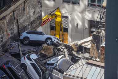 Lower Manhattan garage had history of violations for 'loose,' 'defective' concrete; will be demolished 12 The collapsed roof of the garage at 57 Ann Street.