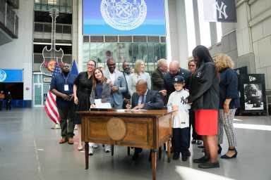 Mayor Eric Adams signs bill