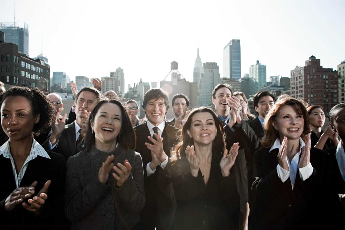 Business people clapping