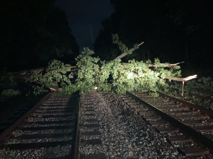 Much of the right-of-way was blocked by fallen trees and other debris