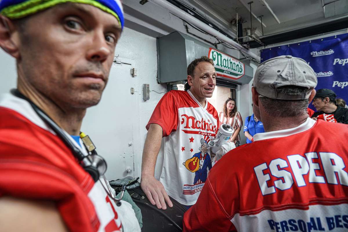 Men’s Nathan’s Hot Dog-Eating contest goes on after lightning delay 10 A rain-soaked Joey Chestnut and fellow competitors inside during the lightning delay in the Nathan’s Hot Dog-eating contest