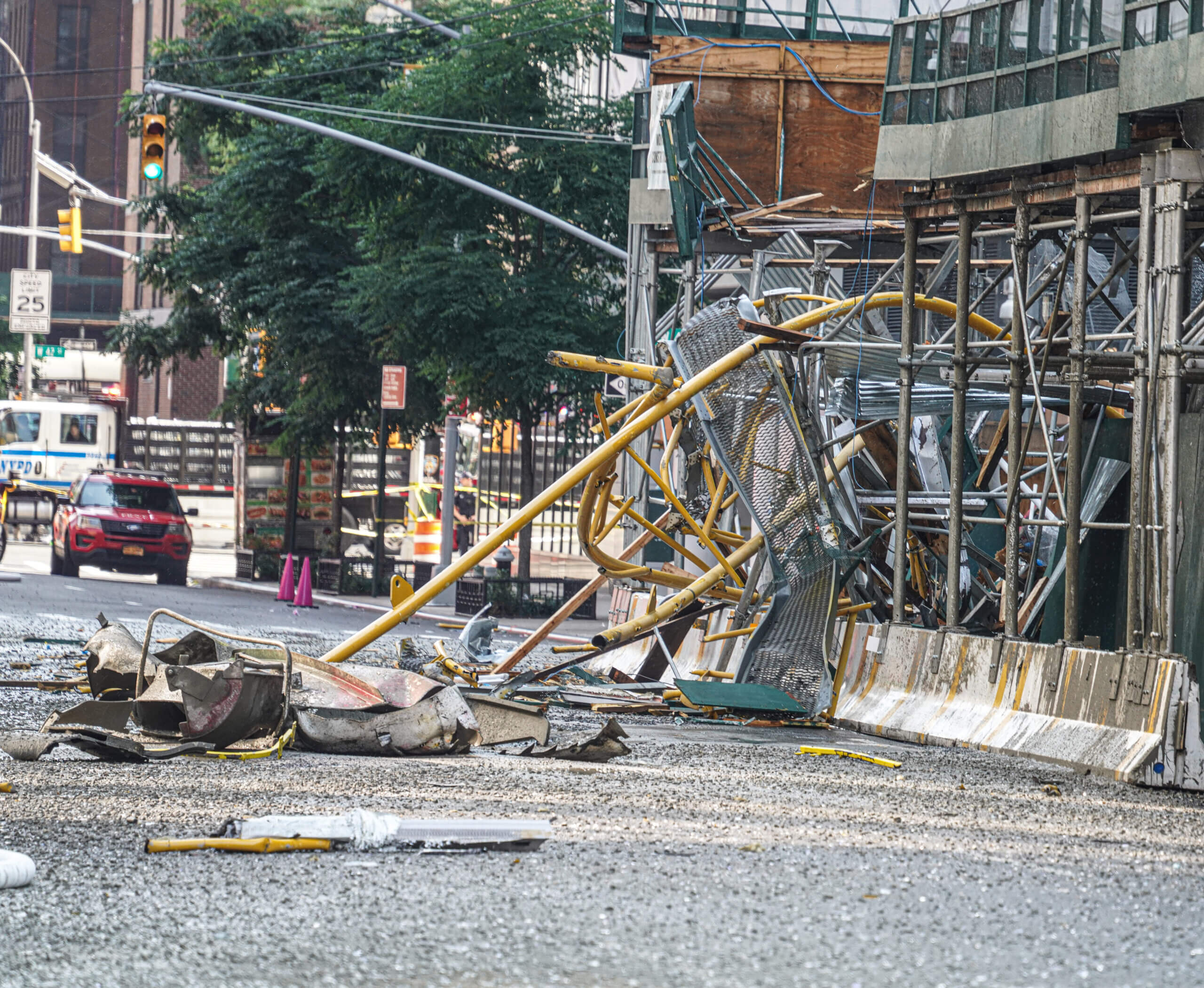 A crane caught fire and partially collapsed on 10th Avenue in Midtown Manhattan