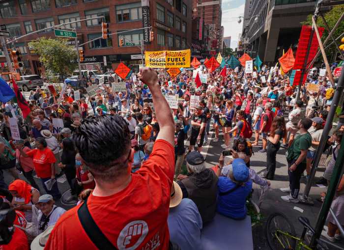 Taking to the streets: Thousands of climate protesters march to end fossil fuels in Midtown 2