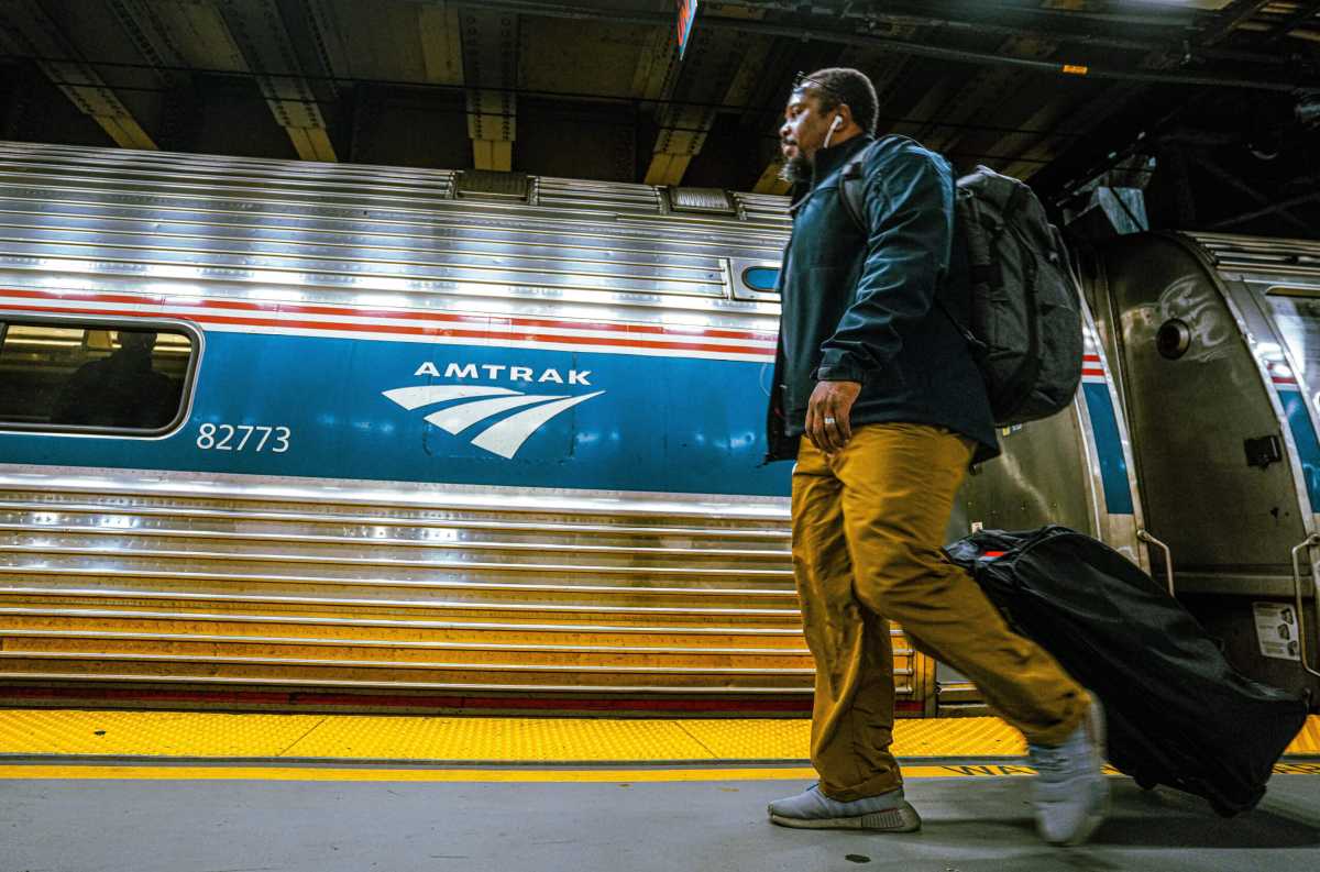 A commuter on the Amtrak platform at Penn Station.