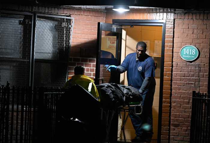 Brooklyn double homicide: Two men shot dead in apartment hallway, cops say 5 Medical Examiner's office personnel wheel out the body of one of two men shot to death in Brooklyn on Oct. 29, 2023.