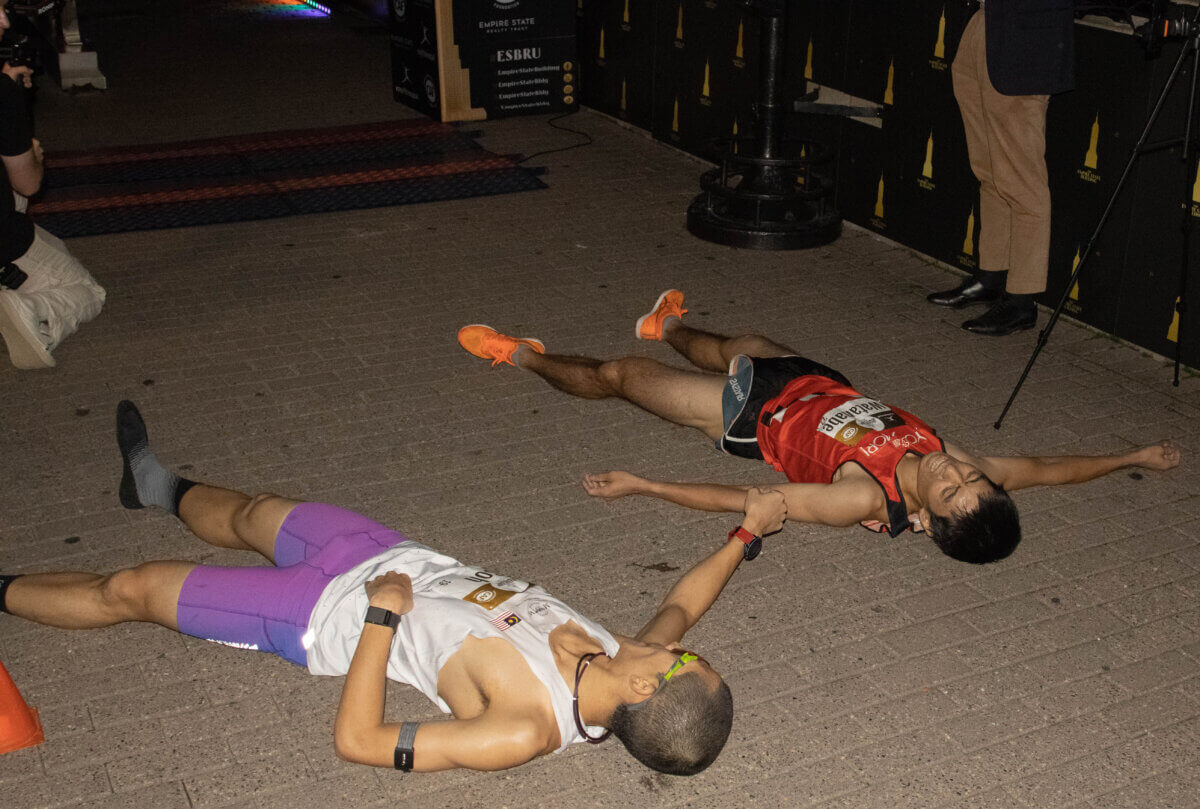 Stepping up: Grueling Empire State Building Run-UP sees 150 people test themselves against 1,576 stairs 5 Wai Ching Soh and Ryoji Watanabe collapsed on the ground after completing the Empire State Building Run-UP