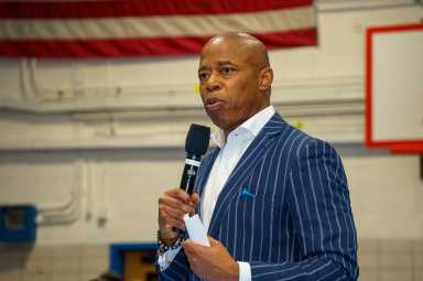 Mayor Eric Adams at an East Harlem town hall on Dec. 4, 2023.
