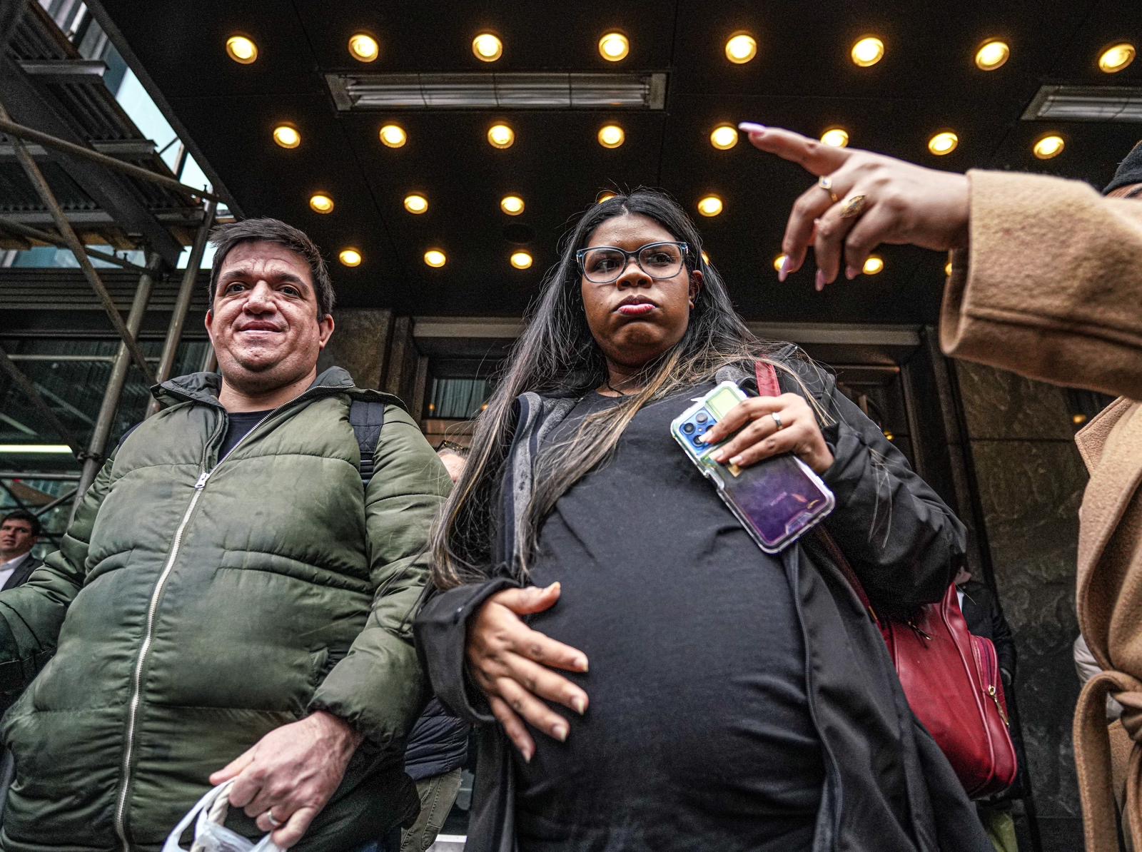 Migrant evictions begin with pregnant women, children forced out of hotel as Lander announces investigation into 60-day shelter cap 10 Maria, clutching her swollen belly and standing alongside her husband David