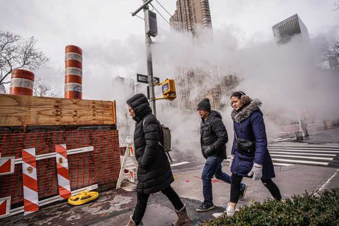 SNOWLESS IN THE CITY: NYC's nearly two-year streak continues after weekend storm proves more wet than wintry 7 New Yorkers walk amid dreary winter storm, snowless streak