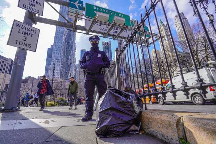 Brooklyn Bridge vendors gone, but the anger and foot traffic congestion remains 6 Police officer on Brooklyn Bridge pathway