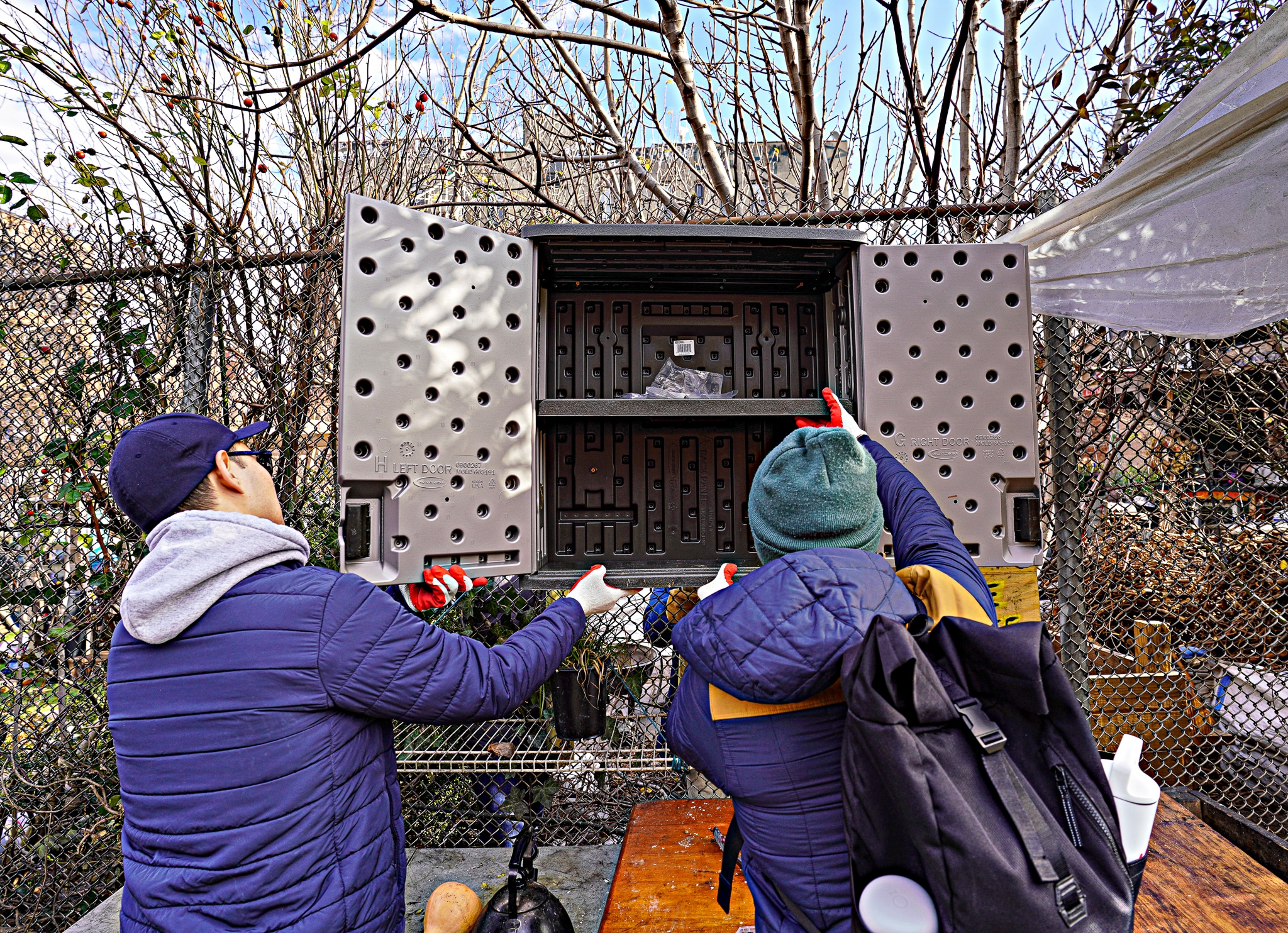 Good works for MLK Day Weekend: Brooklyn migrants, volunteers give back at greenspace 17 Fitting one of the cabinets
