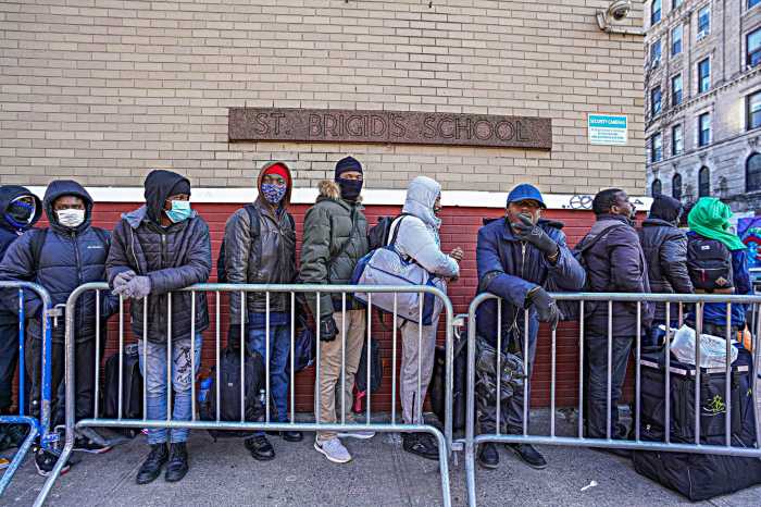Tales of survival: Migrants in East Village struggle to find relief while waiting in the cold on endless lines 16 Migrants in East Village