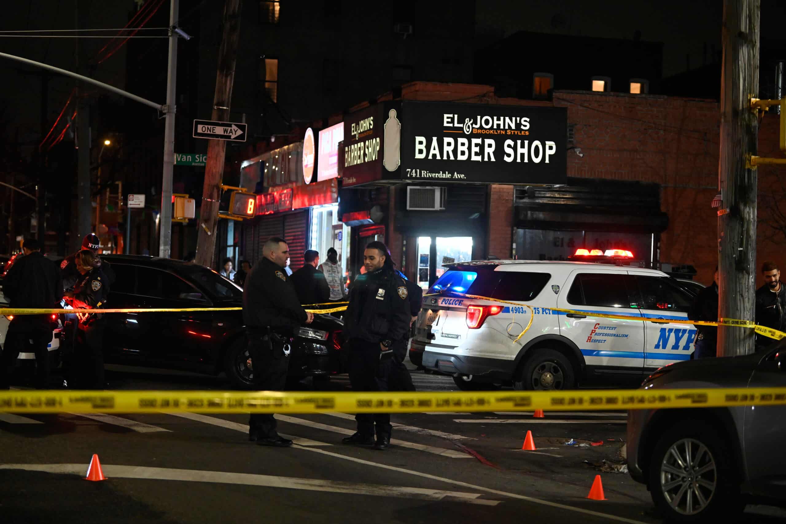 Cops probe Brooklyn shooting that left two men seriously injured 3 Police at Brooklyn shooting scene
