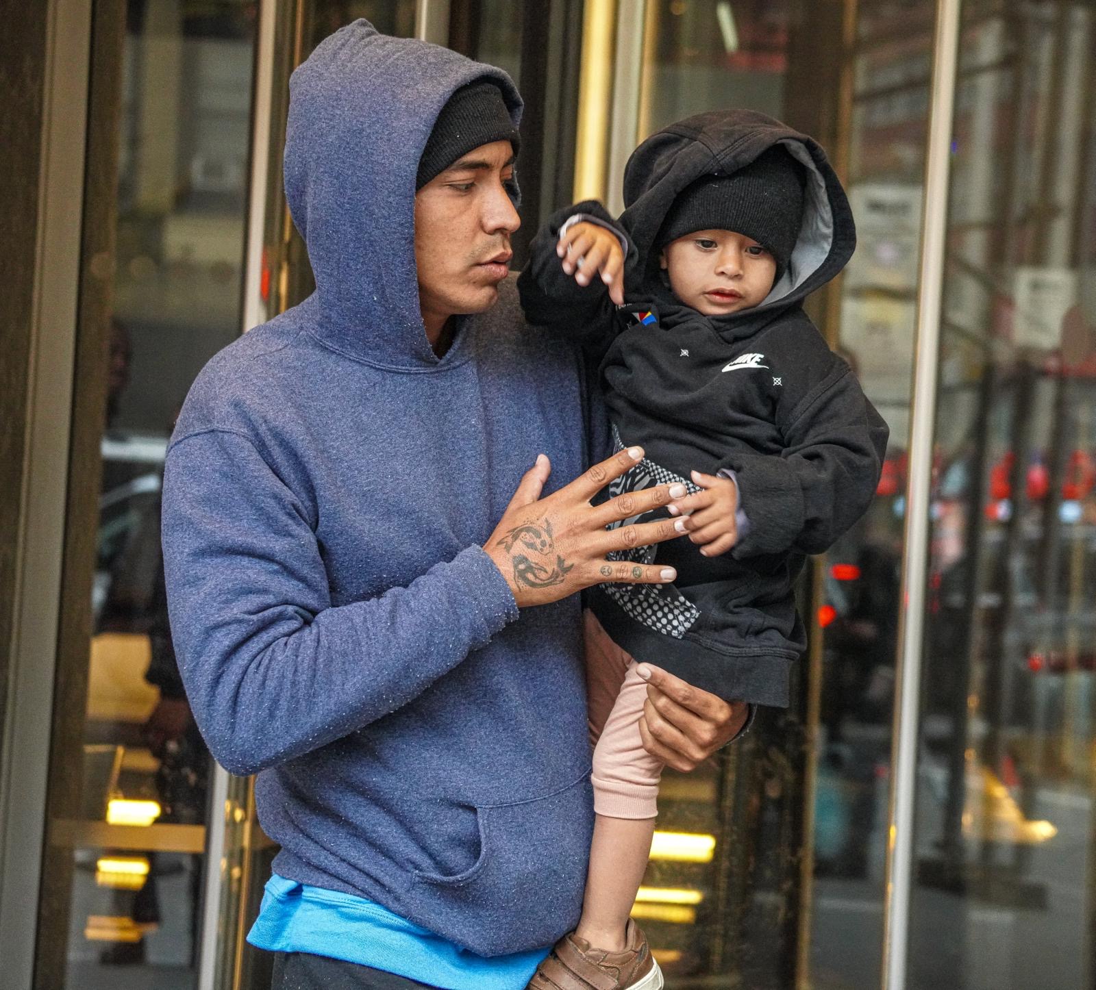 Migrant evictions begin with pregnant women, children forced out of hotel as Lander announces investigation into 60-day shelter cap 16 sullen and concerned, families wandered into an uncertain future