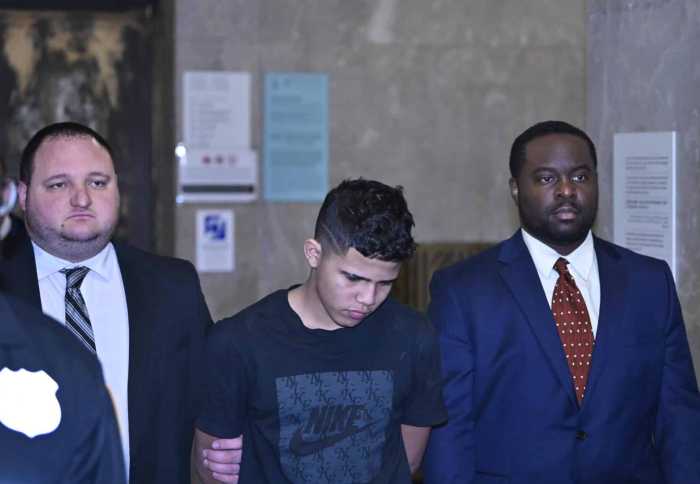 Times Square shooting: Teenage migrant suspect charged as adult, arraigned for attempted murder 7 Times Square shooting suspect with head down heading for arraignment