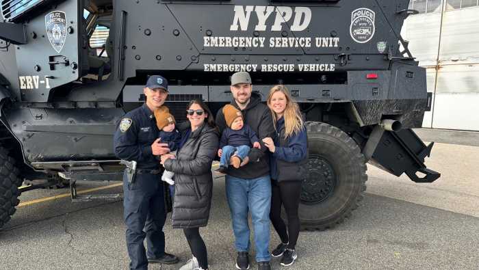 Queens cop killed: GoFundMe raises over $270,000 for slain officer's family; police mull over suspects' real motive 13 Photo of slain officer Jonathan Diller with family in front of NYPD vehicle