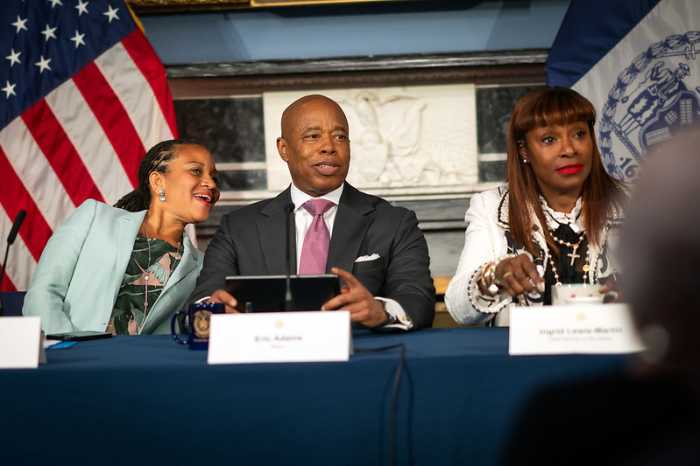 Mayor Eric Adams (center), First Deputy Mayor Sheena Wright (left) and Chief Adviser Ingrid Lewis-Martin.