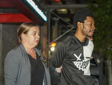 SoHo rape suspect busted by NYPD for attacking woman was out on parole: NYPD 28 SoHo rape suspect in handcuffs escorted by female NYPD detective