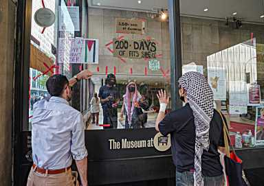 Some on the outside even pressed their hands to the warm glass in a show of solidarity.