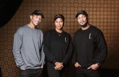 Brandon Carter (l) and Rodney Carter (r), owners of TRENDS in LIC, with their sister Kiara Carter (c).