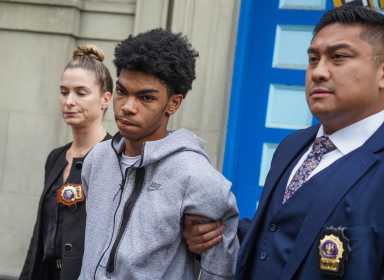Babyface teen cuffed for fatal shooting of 16-year-old boy outside Manhattan school 25 Police cuffed Friday 19-year-old Henry Thomas who allegedly gunned down a 16-year-old boy outside a school in Soho last week, authorities said.