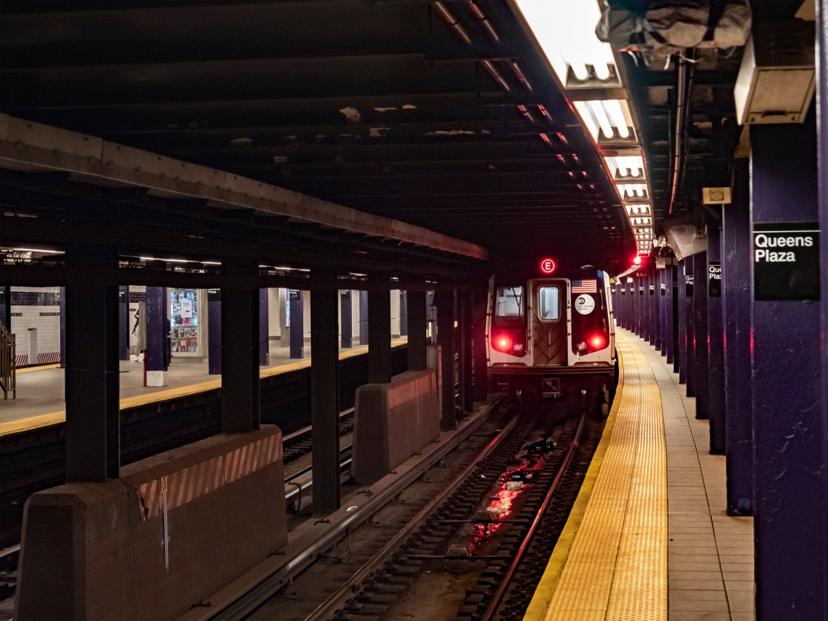 Queens subway slasher with Grubhub bag slices woman on E train: cops 3 Queens subway station with E train pulling out