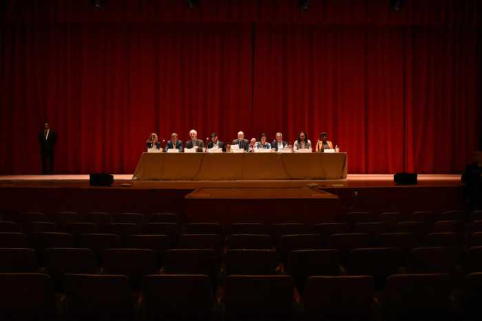 The nine members of the Rent Guidelines Board vote at Hunter College.