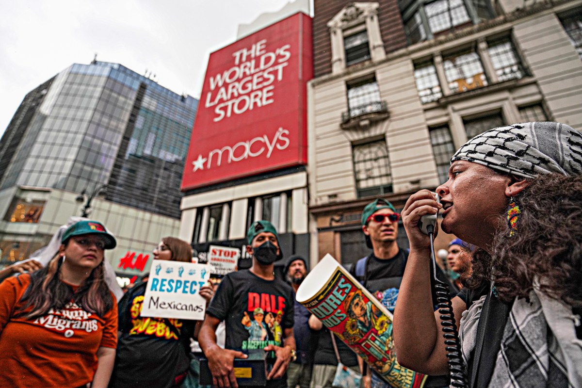 Hundreds of migrants protest in Times Square in protest of Biden's border crackdown 9