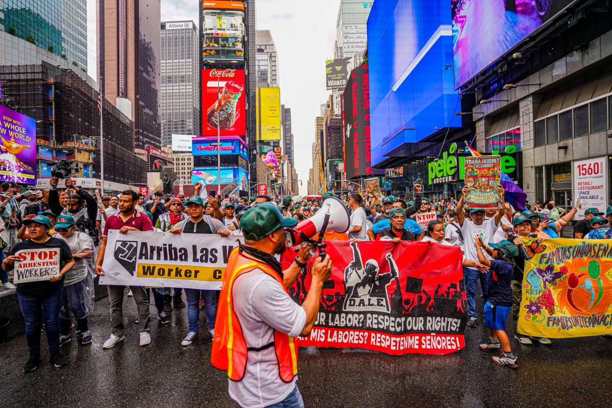 Hundreds of migrants protest in Times Square in protest of Biden's border crackdown 12
