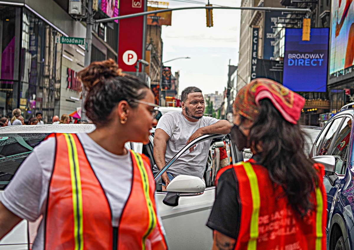 Hundreds of migrants protest in Times Square in protest of Biden's border crackdown 13