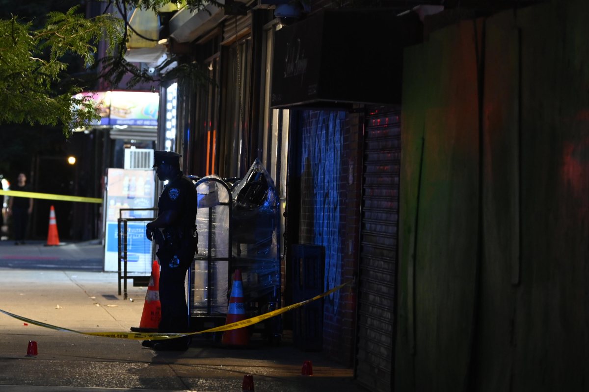Man in Brooklyn shot dead during argument near dollar store: cops 4 Brooklyn police officer stands guard at scene where man was shot