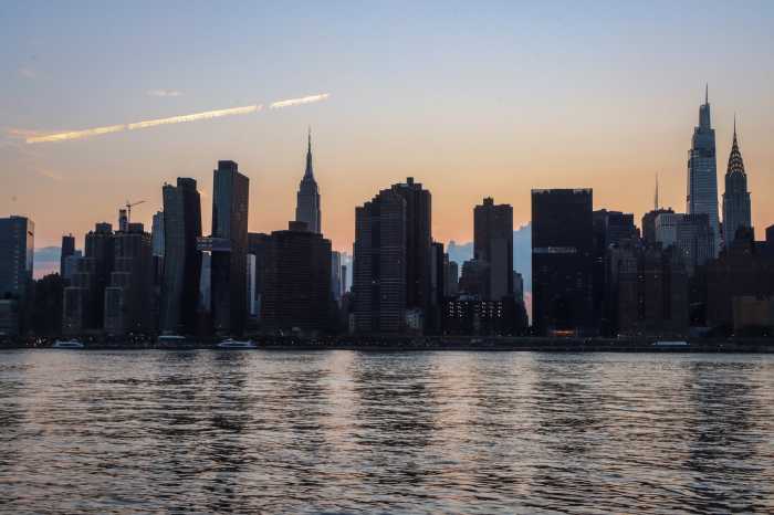 The sun sets on Manhattanhenge 2024 with cloud coverage obstructing the view 5 The view of Manhattanhenge from Hunter’s Point South Park was obstructed by low cloud coverage on July 13, 2024.