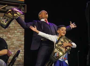 Cody Rhodes showcased what it really means to be “the people’s champion” when he broke auction rules at Fanatics Fest and gave a child a free autographed belt.