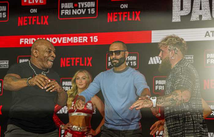 Mike Tyson and Jake Paul face off at Fanatics Fest for the first time since match was postponed 2 Mike Tyson and Jake Paul have a shoving match.