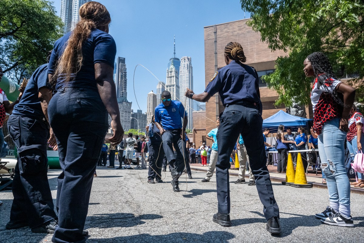 NYPD hosts Back-To-School-Bash at 1 Police Plaza 9 An NYPD Officer shows off his double dutch skills.