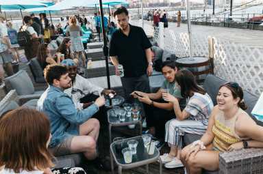 a group of friends hanging out at Cobble Fish