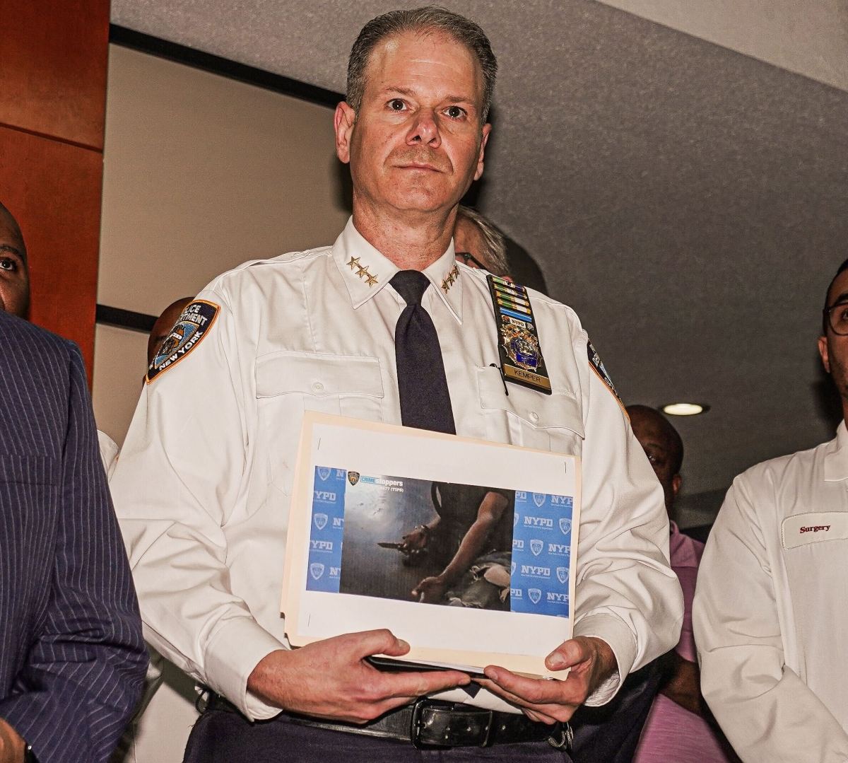 Brooklyn subway shooting leaves one cop wounded, three people injured in apparent case of friendly fire 4 Outgoing Chief of Department Michael Kemper holds a photo of the knife recovered from the suspect
