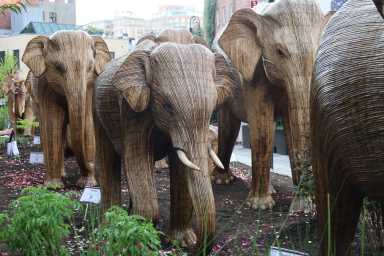 Statues of wooden elephants in Meatpacking District