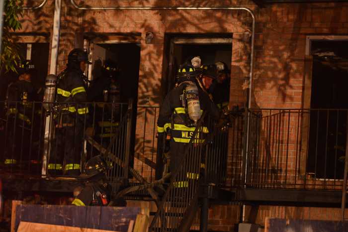 Two-alarm Queens fire rips through partially-completed homes: FDNY 6 Queens firefighter search home in two-alarm fire