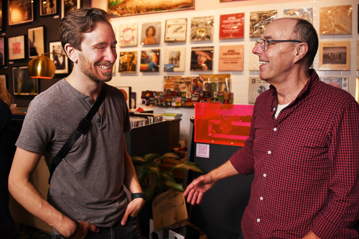 Guarinello and photographer Dan Root at the launch for Root's book "New York Bars at Dawn" in the original shop location downstairs at Essex Market